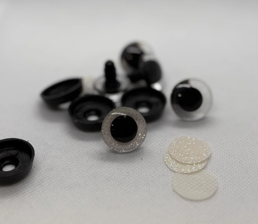 Oči s pojistkou glitrové bílé 20 mm