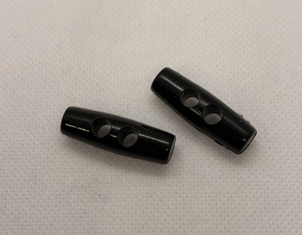Knoflík oliva 30x10 mm černý