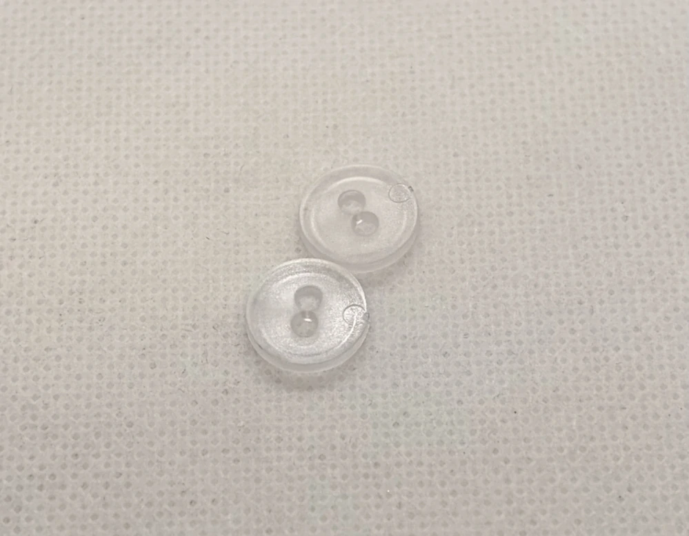 Knoflík 11 mm čirý