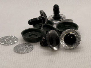 Oko s pojistkou glitrové stříbrné 20 mm