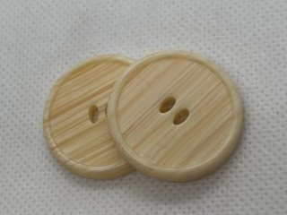 Knoflík béžový žíhaný 20 mm